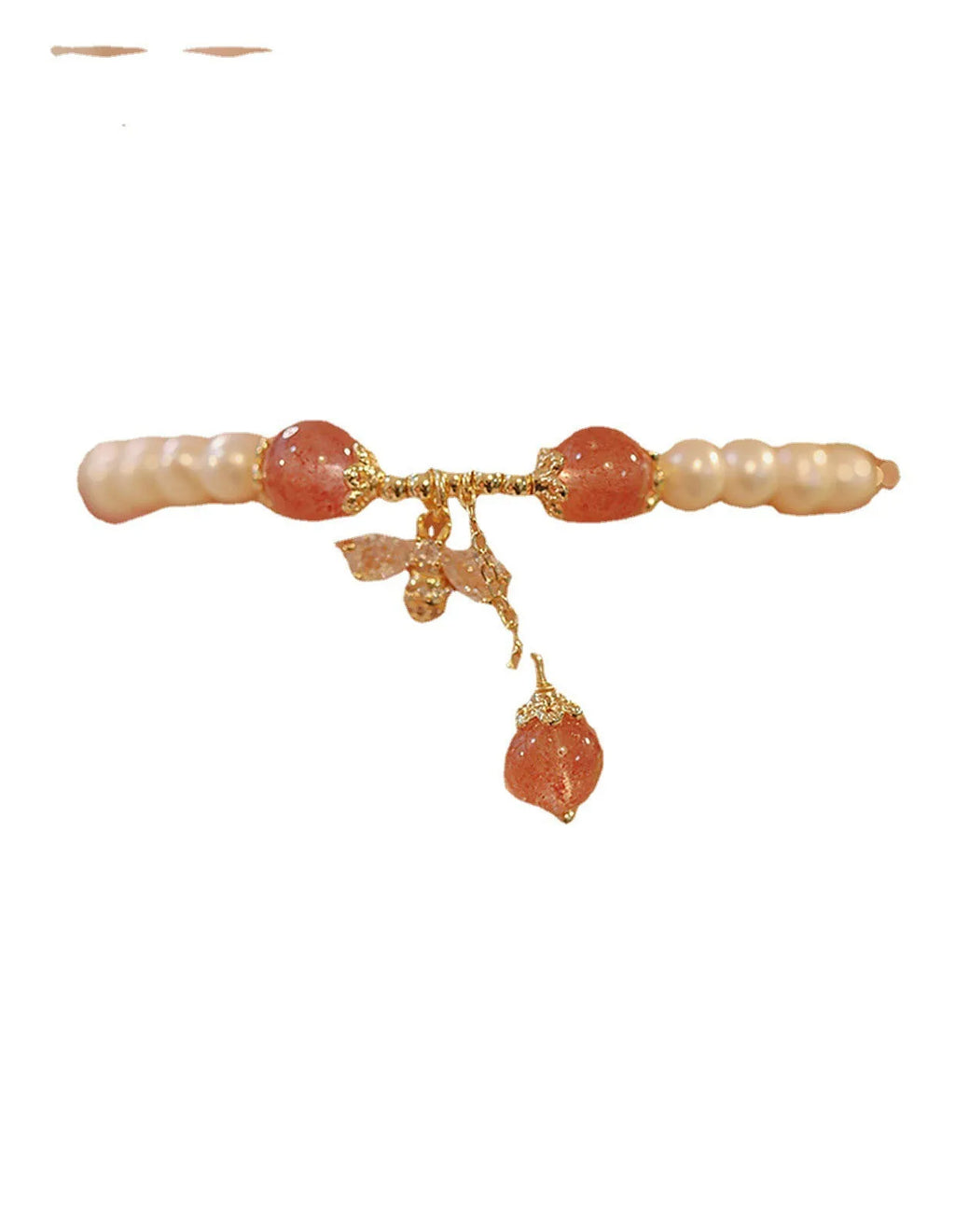 Women's strawberry quartz crystal bracelet with bow clasp closure on wrist