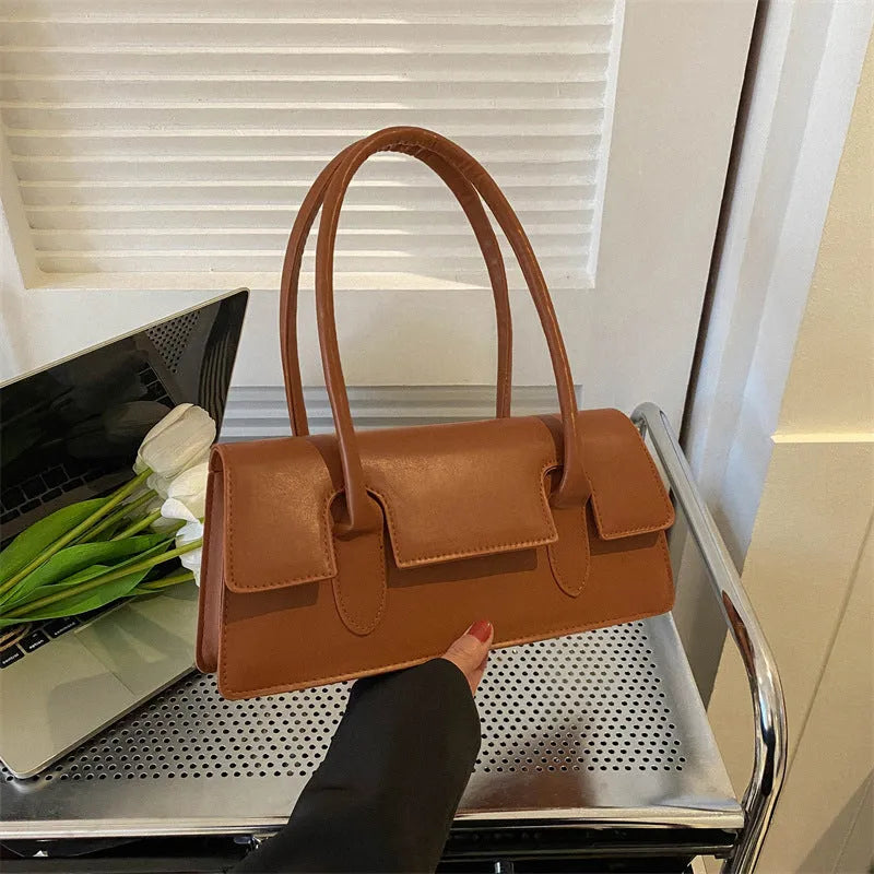 Women's retro square PU shoulder bag with stitching details and sandwich pocket exterior