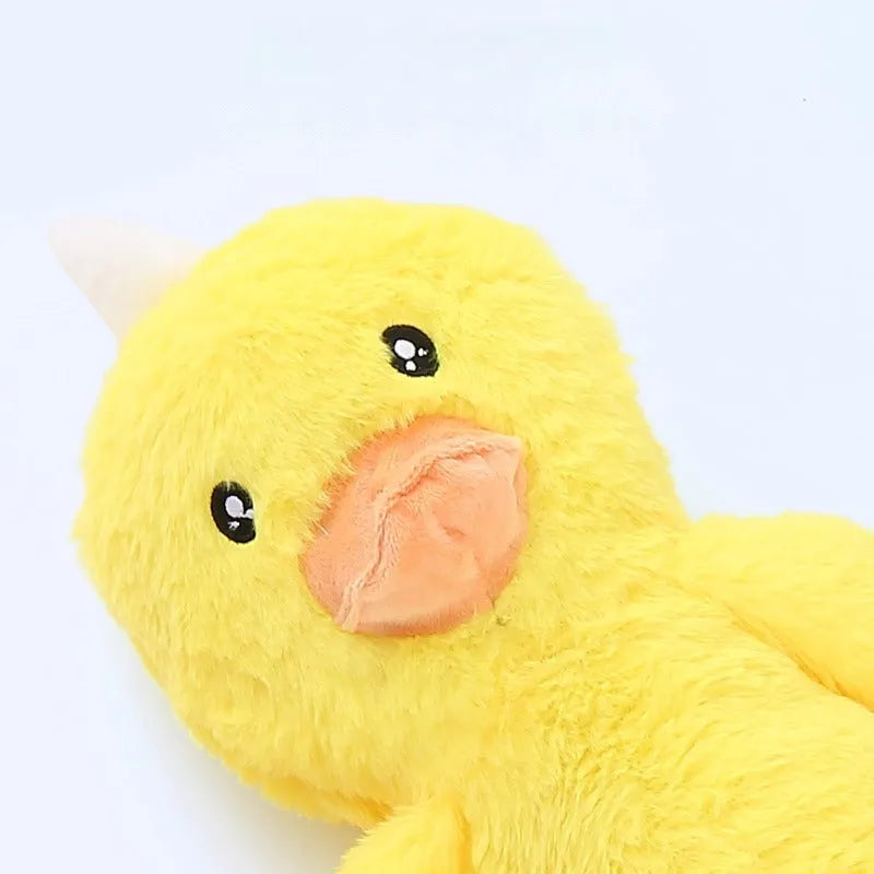 Large pink and yellow plush dog toy with sounding rattle, crinkle paper and chewing texture features