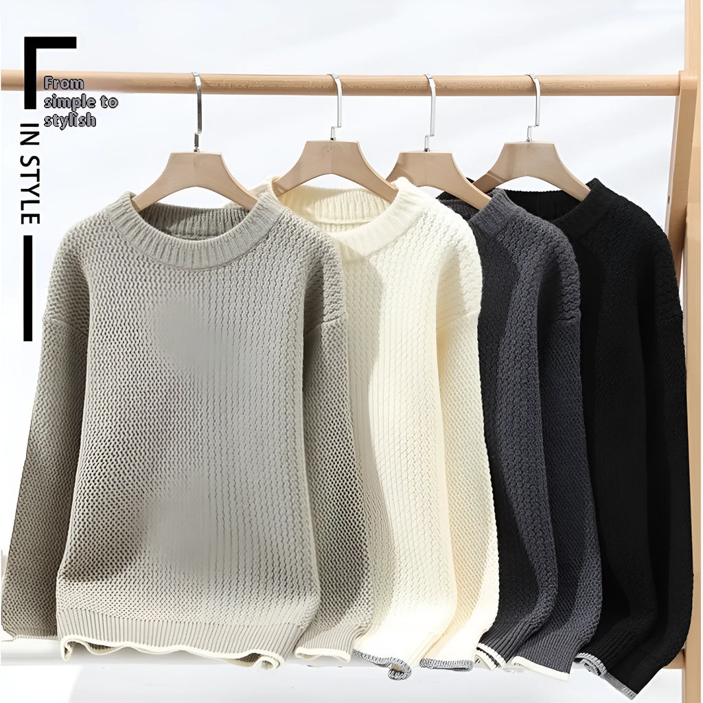 Grey men's loose fit round neck long sleeve casual pullover sweater on a hanger.