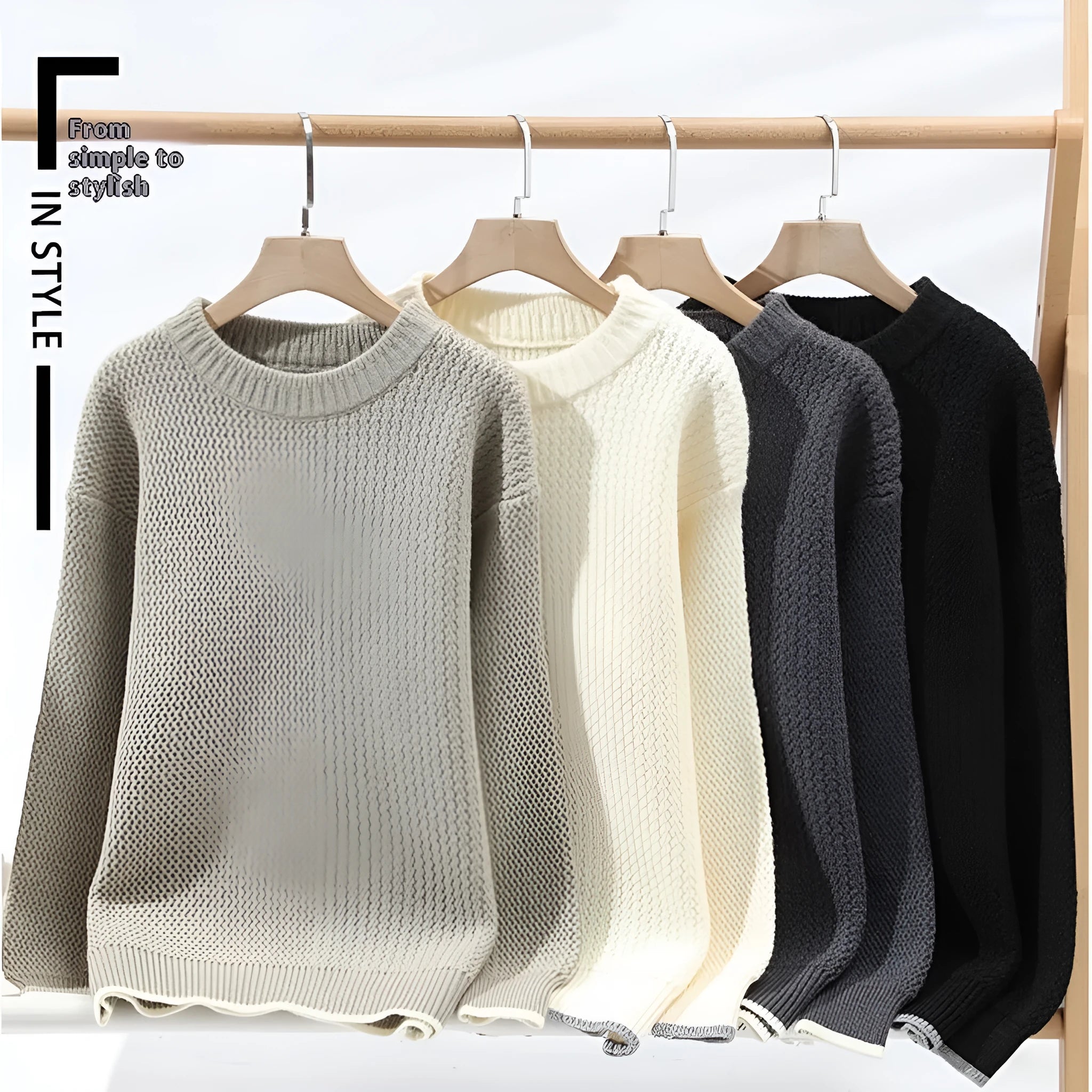 Grey men's loose fit round neck long sleeve casual pullover sweater on a hanger.
