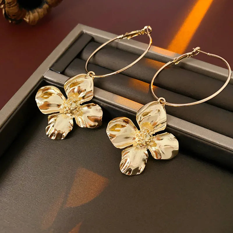Silver Needle geometric flower design drop earrings in gold or silver electroplated metal alloy