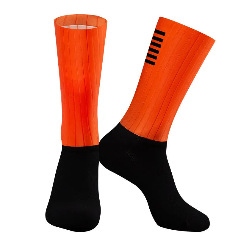 A pair of breathable athletic sports socks for cycling and running, shown in one of six available colours.