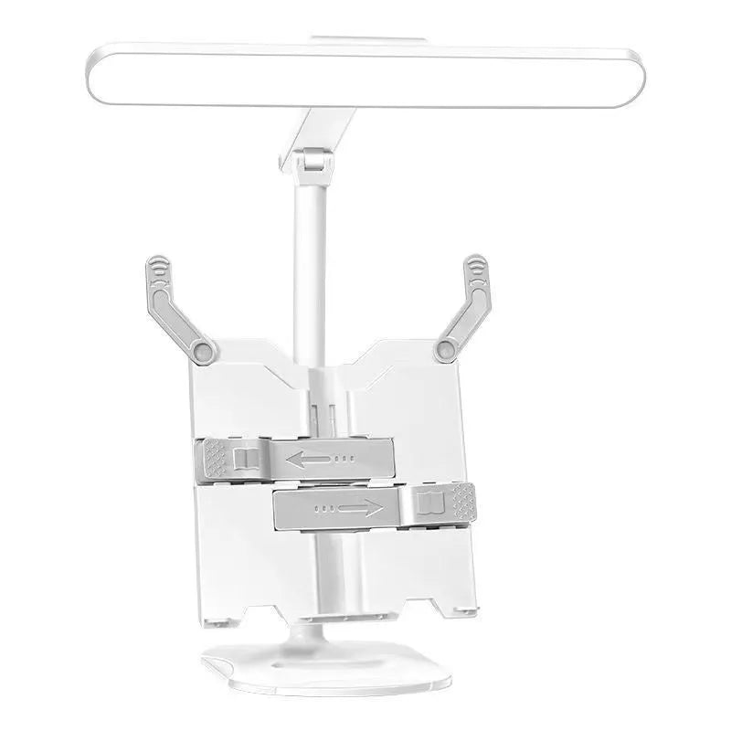 Multifunctional adjustable table lamp on a bookshelf showing three colour temperature settings and dual charging plug