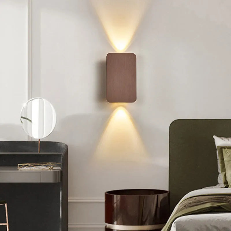 Modern Nordic minimalist LED wall lamp in black finish showing three light colour options