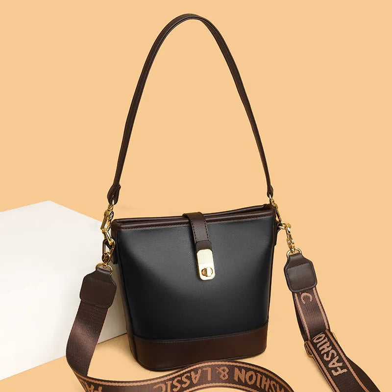 Korean style women's bucket bag in black with double shoulder straps and internal organiser compartments