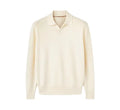 Pure wool lapel-collar polo sweater in a loose fit, shown in milky white.