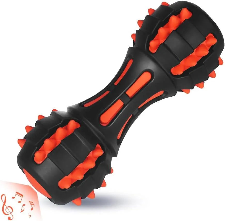 Red dumbbell-shaped durable rubber dog chew toy for medium and large breeds on a white background.