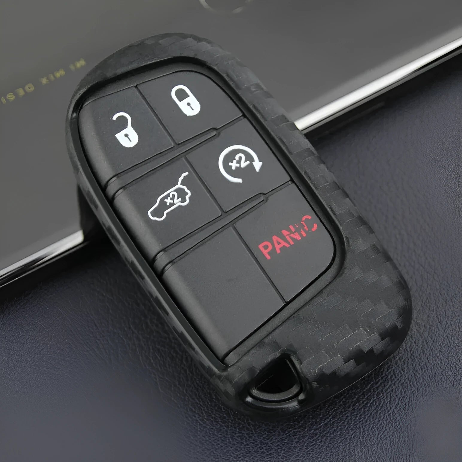Silicone rubber protective case for Dodge Chrysler Fiat car keys with carbon fibre pattern.