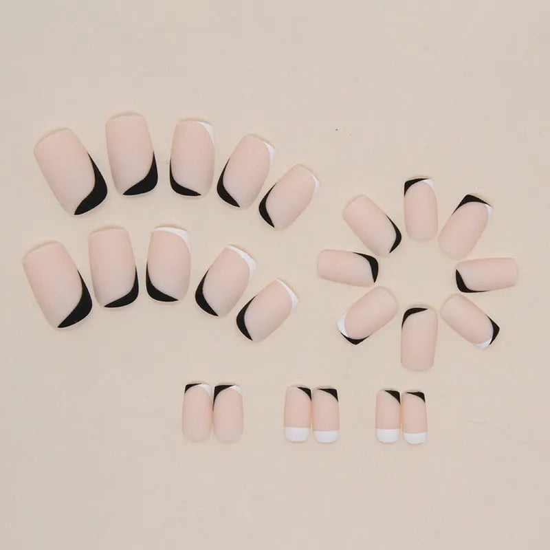 Black and white frosted matte false nails with mandarin duck colour split design.