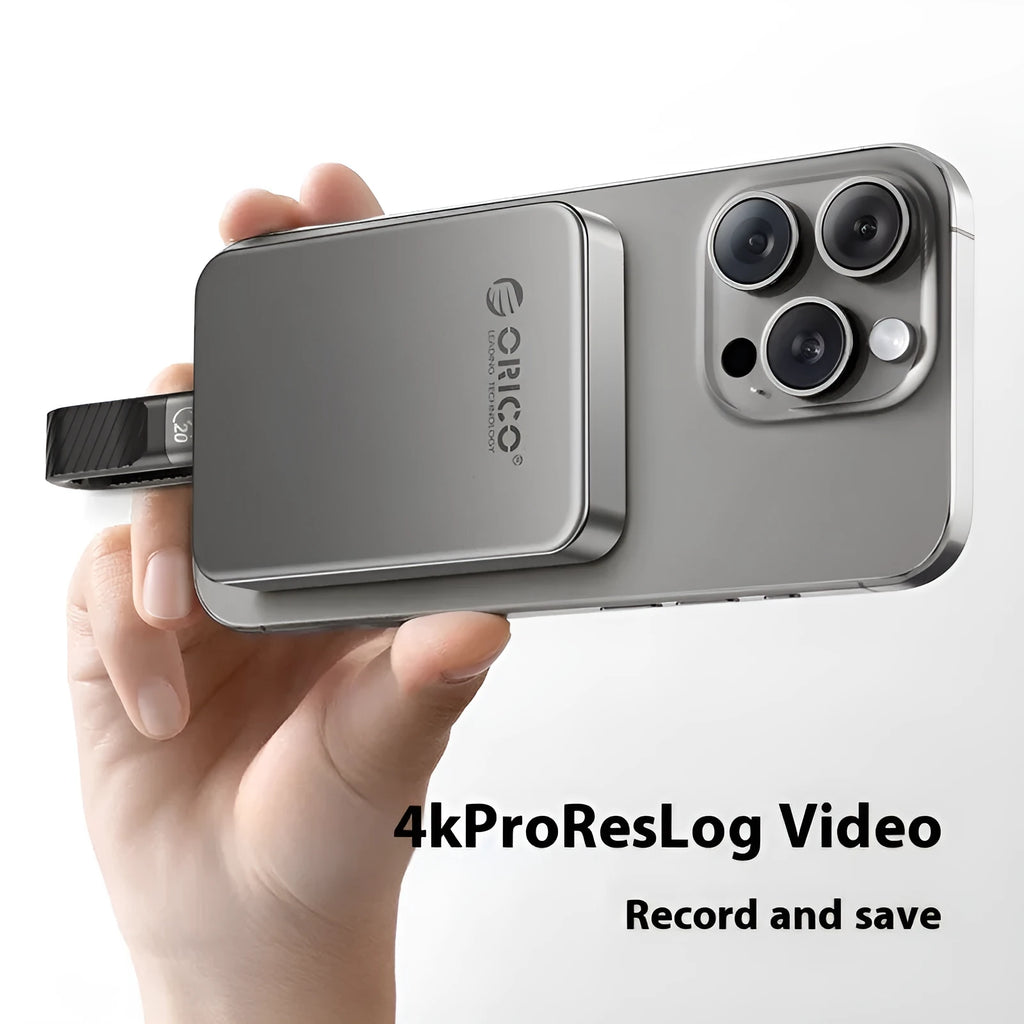 Grey magnetic mobile SSD measuring 80x60mm with ultra-thin 11.2mm profile and included C to C cable