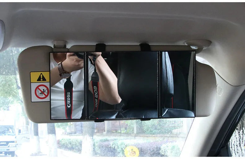 Silver car folding makeup mirror shown open and closed, demonstrating its size change.
