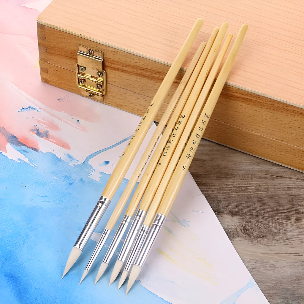 Six wooden hook line pen brushes for drawing and sketching arranged together.