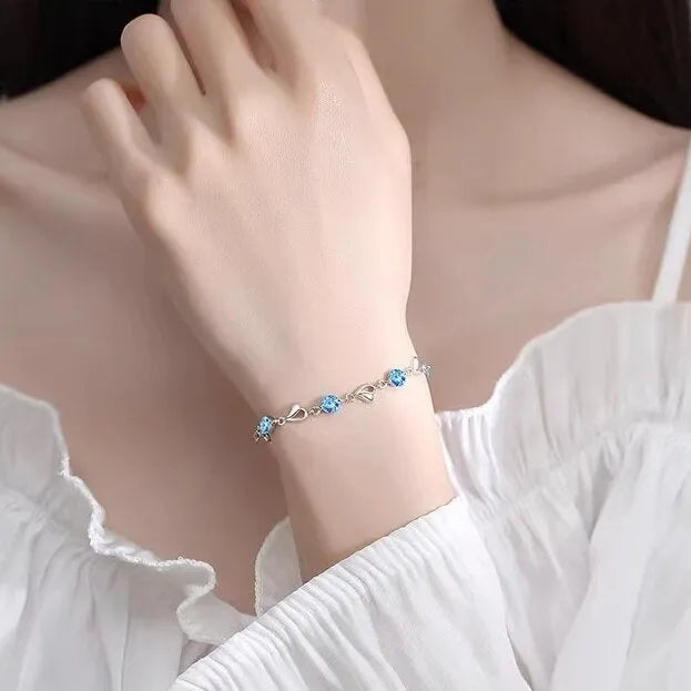 Blue geometric heart necklace and bracelet set with mixed gem inlays on copper chains