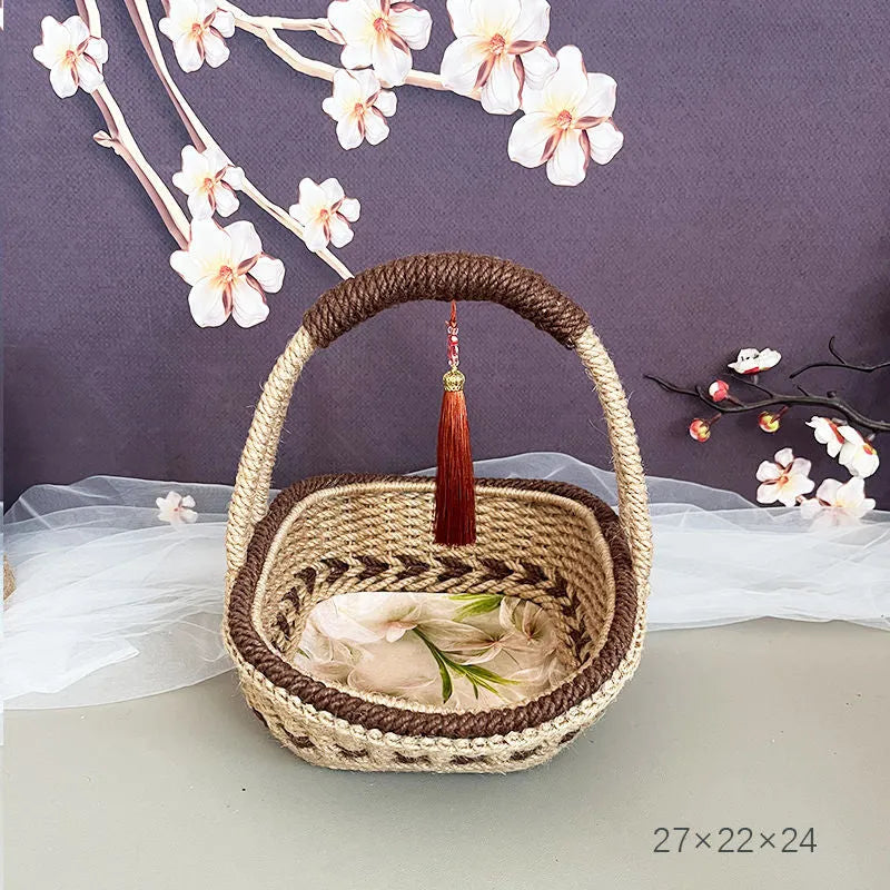 Hand-woven straw basket with hemp rope detailing in coffee brown colour