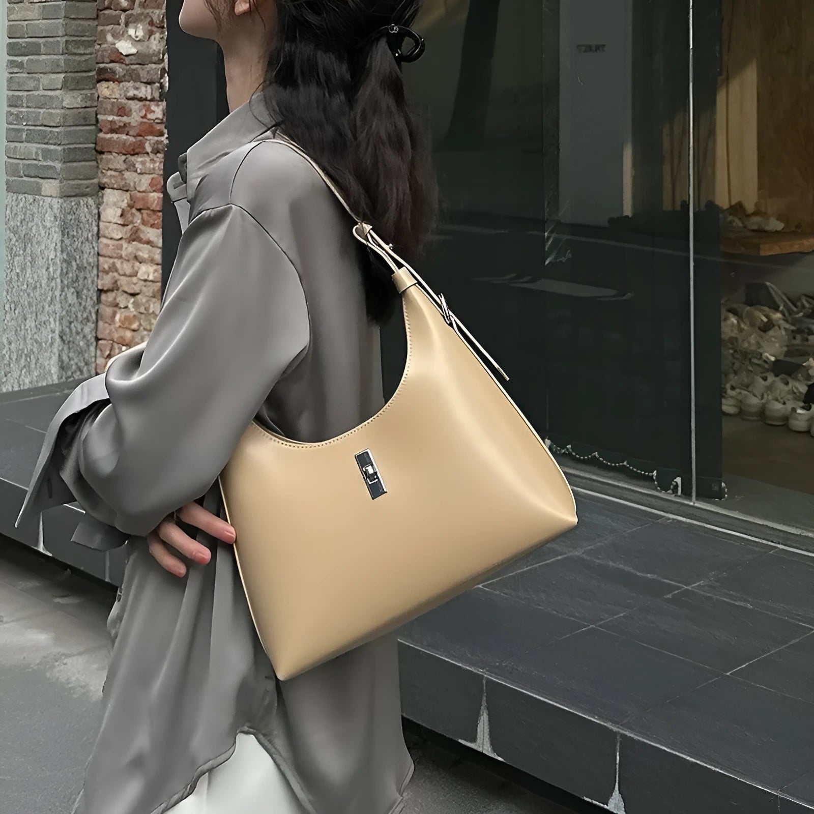 Genuine leather crossbody shoulder bag in dumpling shape with internal organiser compartments