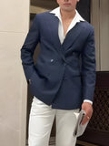 Men's striped double breasted blazer jacket on a hanger showing regular fit design