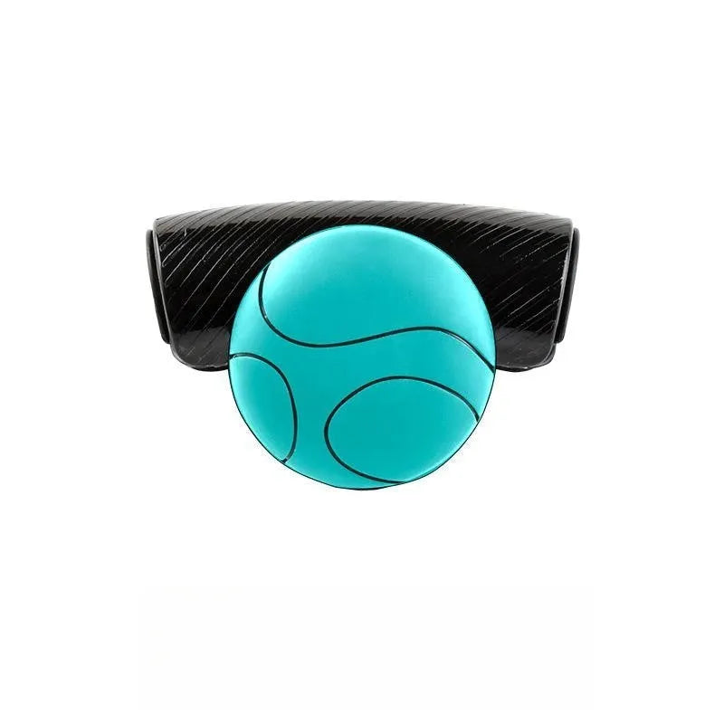 Black and blue silicone steering wheel assist ball showing 9cm by 6cm dimensions