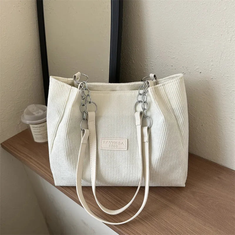 Corduroy tote bag with three-dimensional pockets in black colour option
