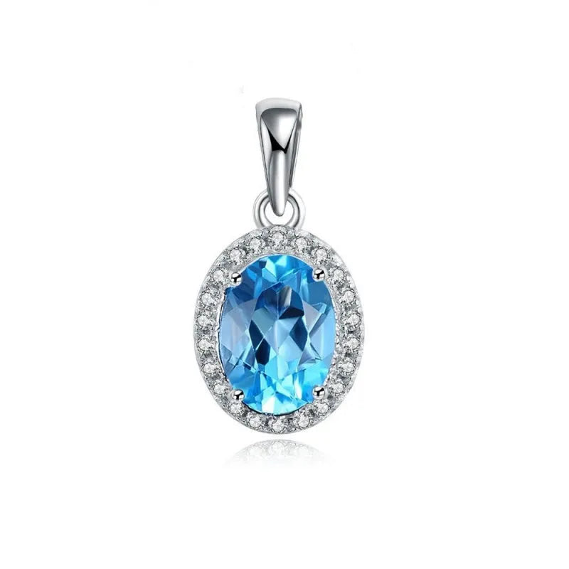 Women's 925 sterling silver and blue topaz four-piece jewellery set with geometric design, showing earrings, ring, necklace, and pendant.