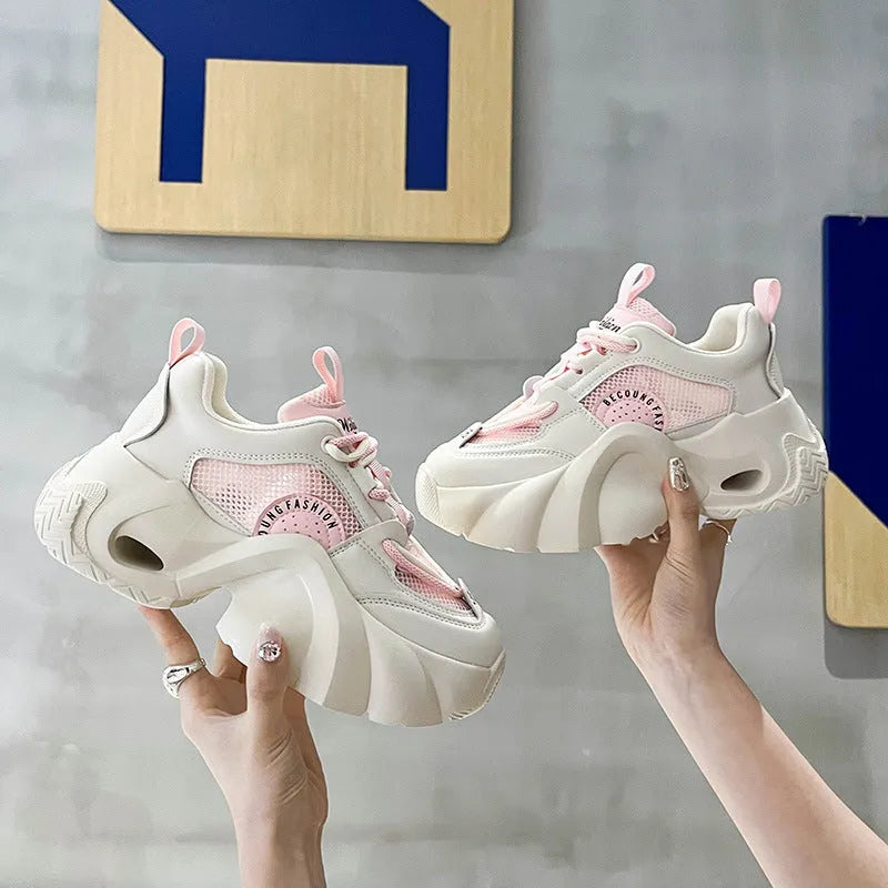 Women's beige sneakers with a cross strap and thick sole
