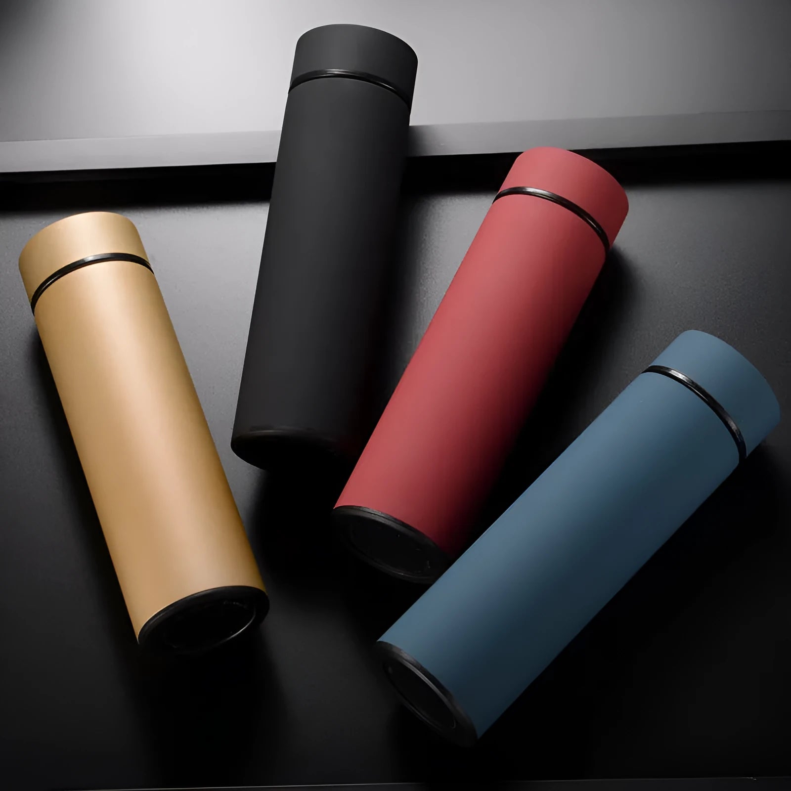 450ml stainless steel vacuum insulated water bottle in black, red, gold, or blue with double wall construction