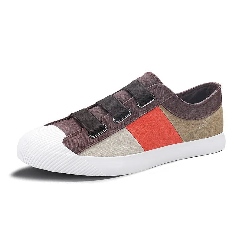 Men's low-top canvas sneakers in beige with elastic band closure and a vulcanised rubber sole.