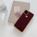 Clear solid colour TPU back cover case for iPhone on a table, shown in blue.