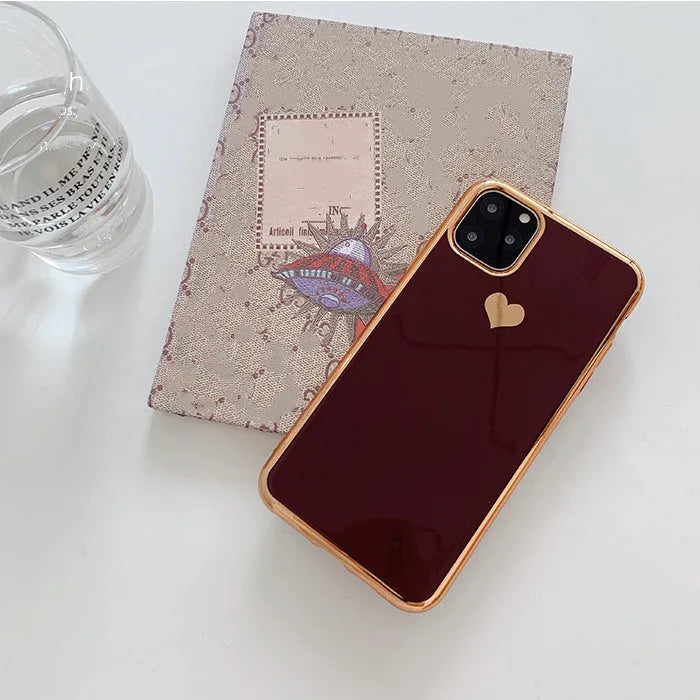 Clear solid colour TPU back cover case for iPhone on a table, shown in blue.
