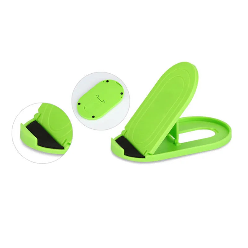 Plastic mobile phone stand with lazy bracket design shown in multiple colour options on a desk