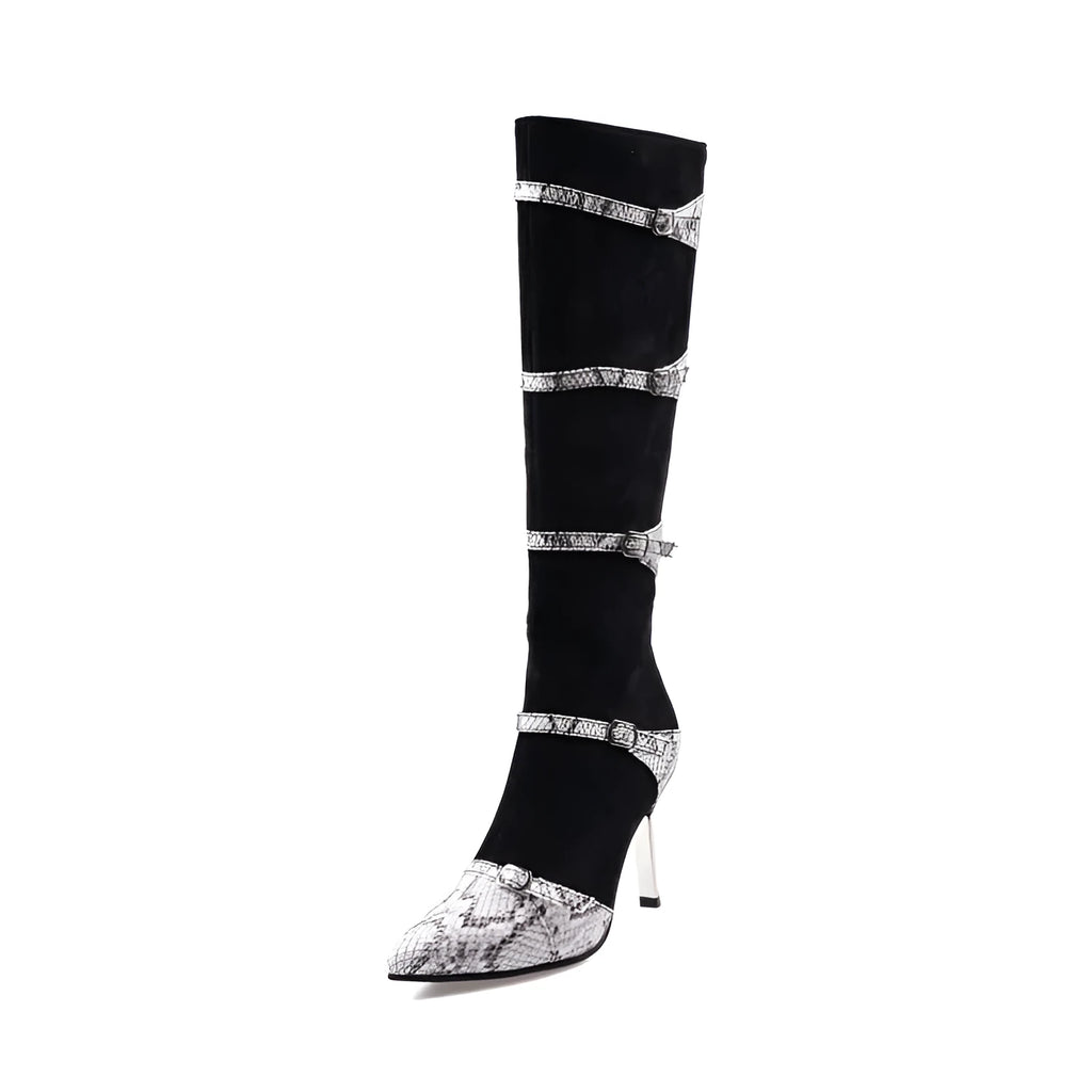 Women's grey knee-high boots with thin high heels on a wooden floor