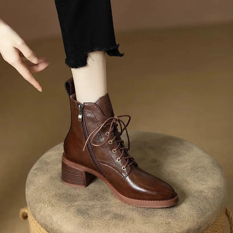 Women's black pointed-toe short tube boots with 5.5cm heel and artificial PU upper