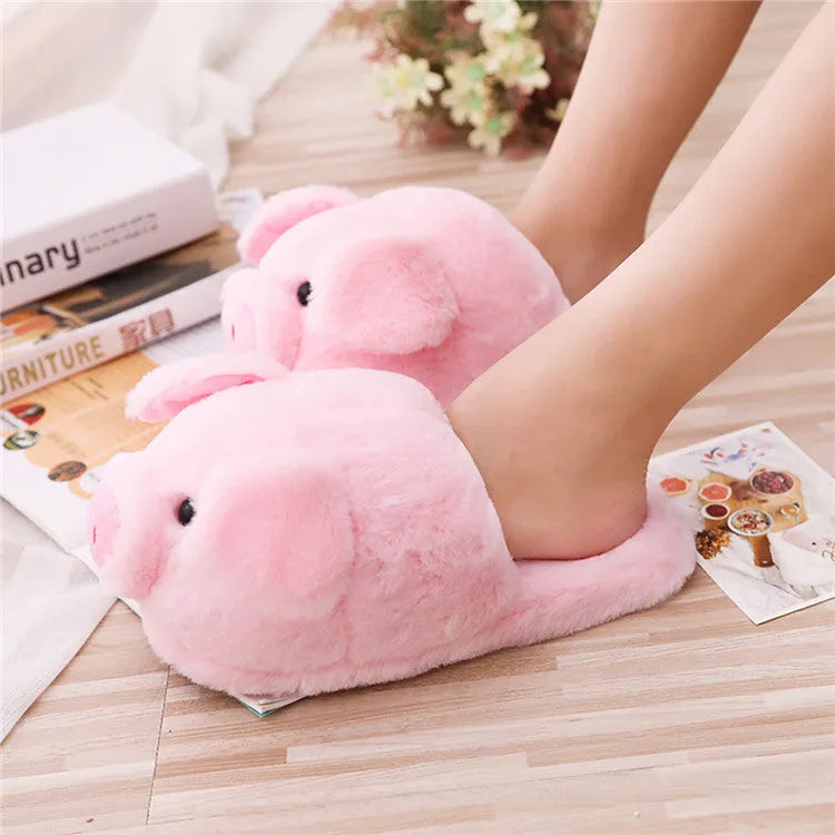 Pink pig floor slippers with short plush material showing size conversion chart for international measurements