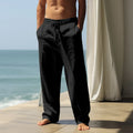 Man wearing loose-fitting solid colour cotton casual trousers in a leisure setting