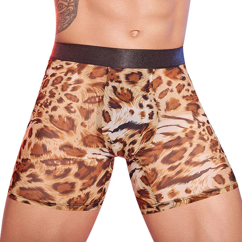 Men's leopard print nylon boxer shorts laid flat, showing the full animal pattern and elastic waistband.