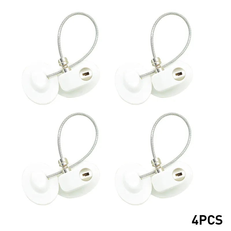 White window security chain lock with steel cable and adhesive base on a window frame