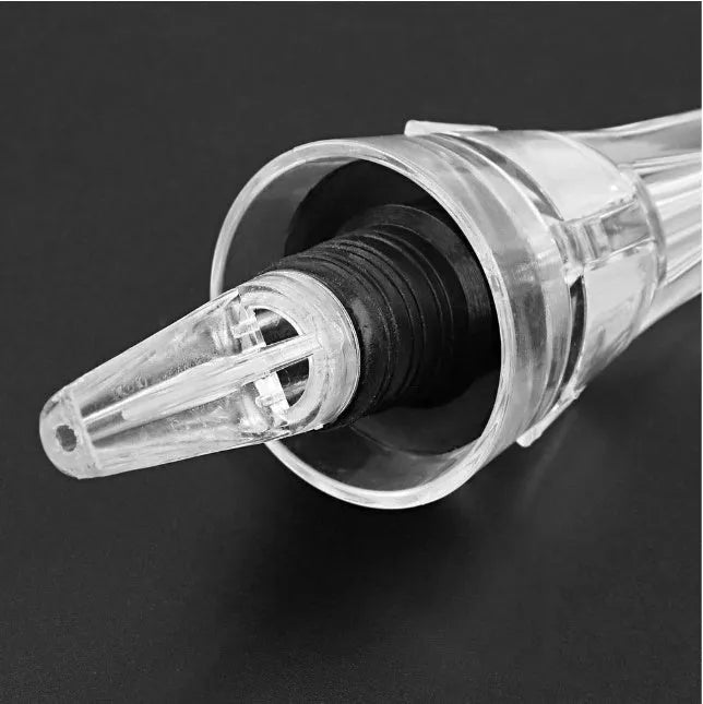 Acrylic wine aerator with stainless steel filter, measuring 16cm by 4.2cm.