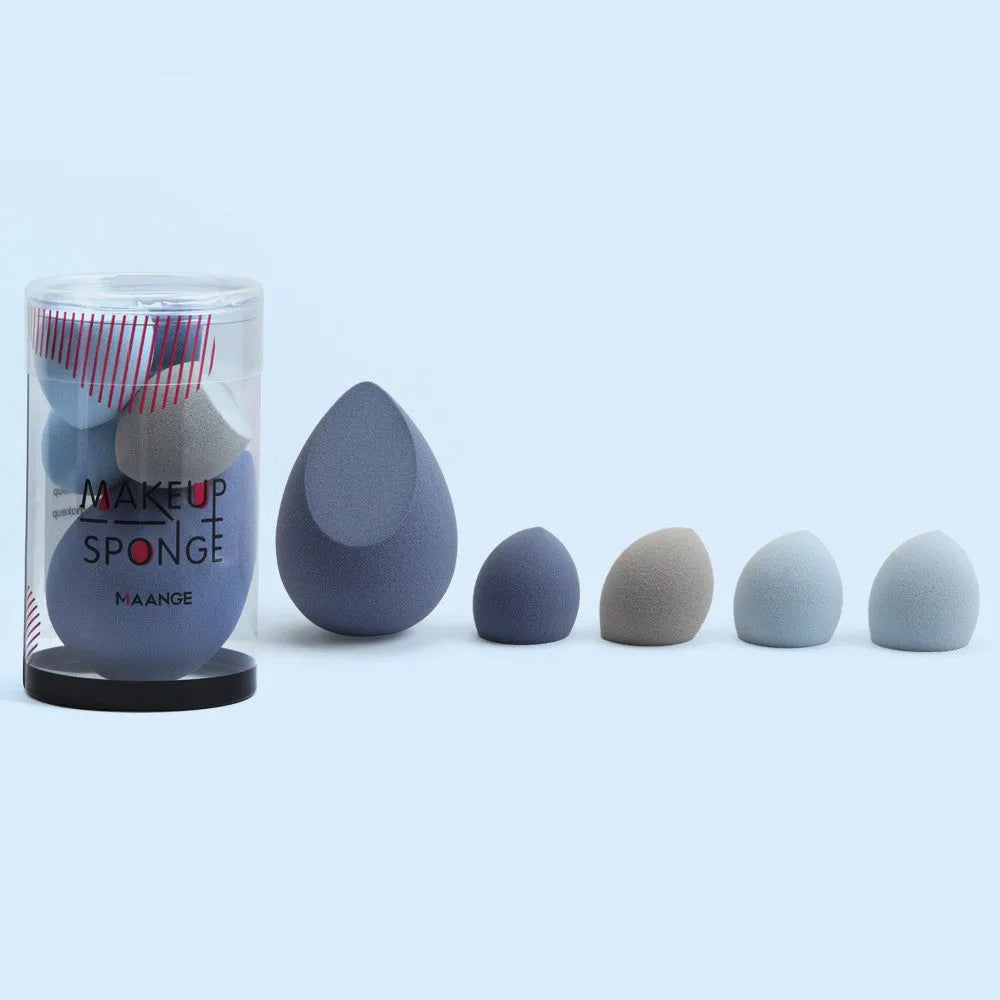 Five mini beauty eggs cosmetic sponges in blue pink and purple with flocking velour surface