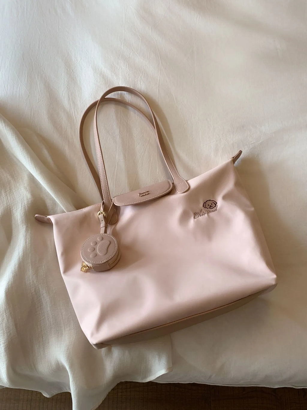 Beige and Pink Oxford cloth tote shoulder bag with sandwich pocket and large capacity.