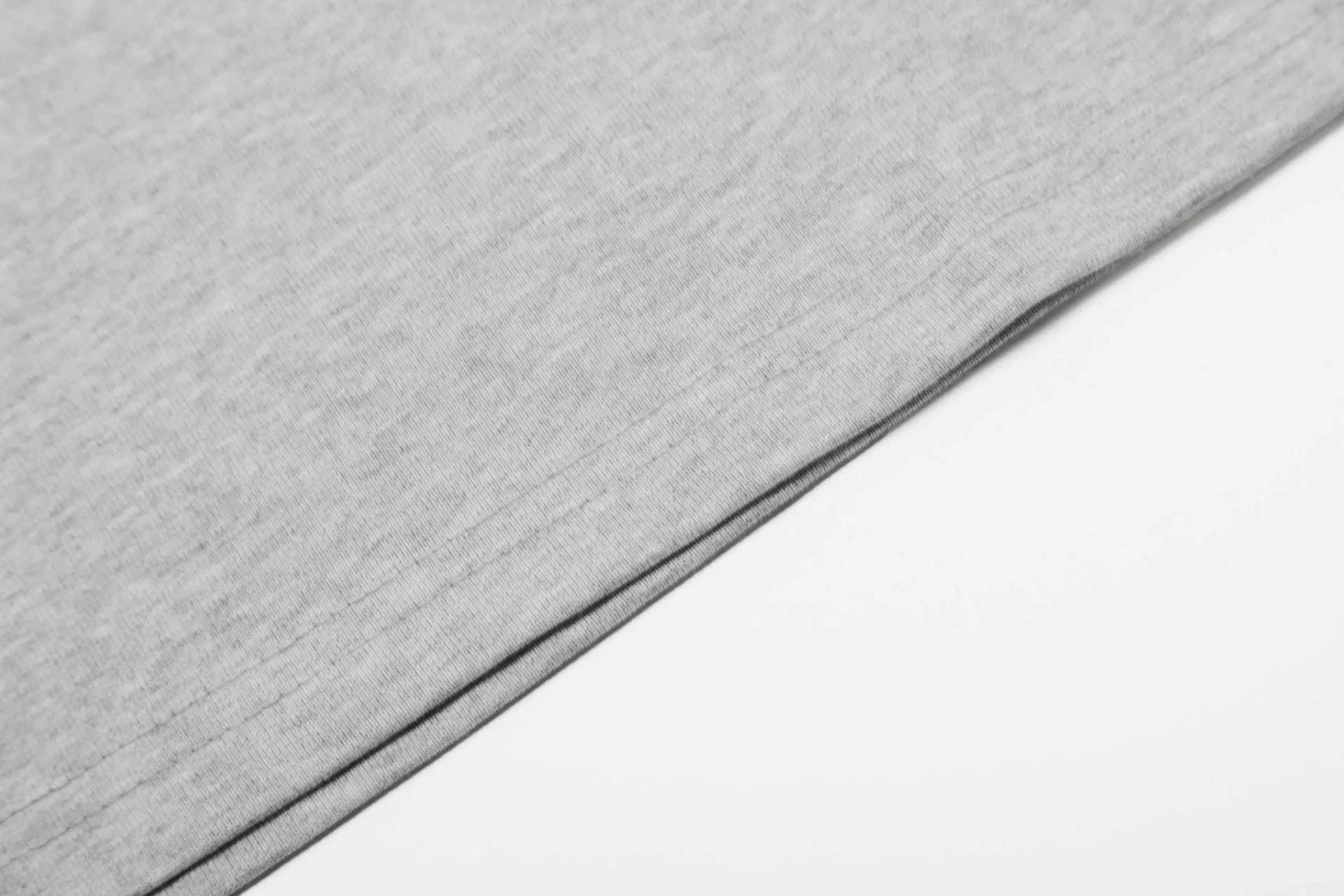 Men's loose fit black and grey cotton long sleeve casual T-shirt on a hanger.