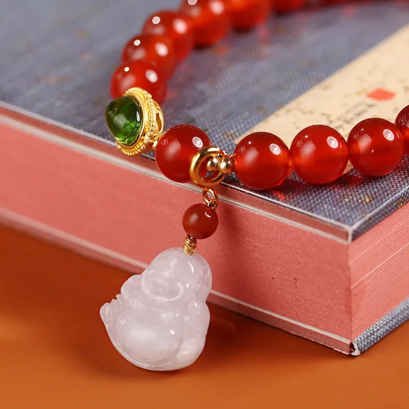 Red agate and amber bracelet with geometric Chinese design and Maitreya Buddha charm