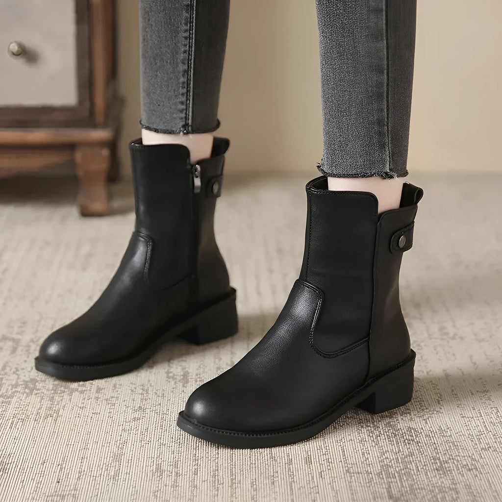 Black women's ankle boots with side zipper and low heel on round toe
