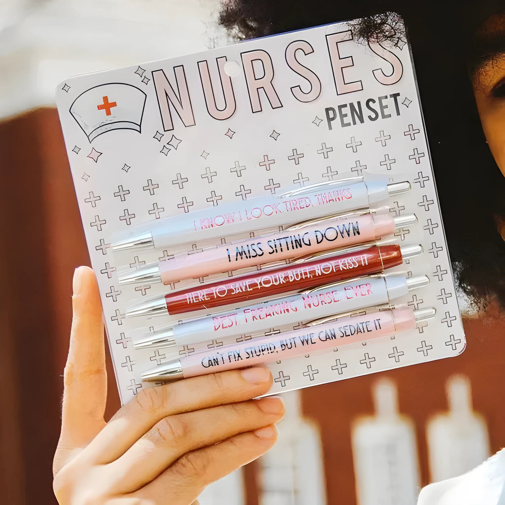 Five nurse theme ballpoint pens with retractable mechanisms and medical humour text