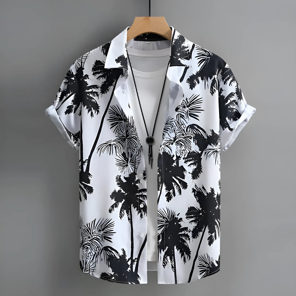 Man wearing a blue and white 3D printed Hawaiian pattern short sleeve cardigan shirt.
