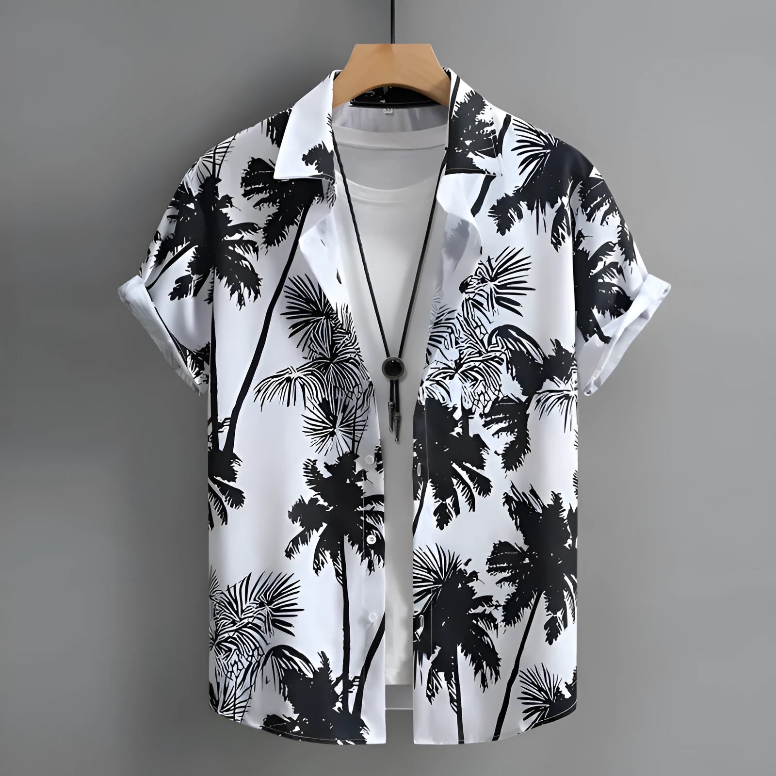 Man wearing a blue and white 3D printed Hawaiian pattern short sleeve cardigan shirt.