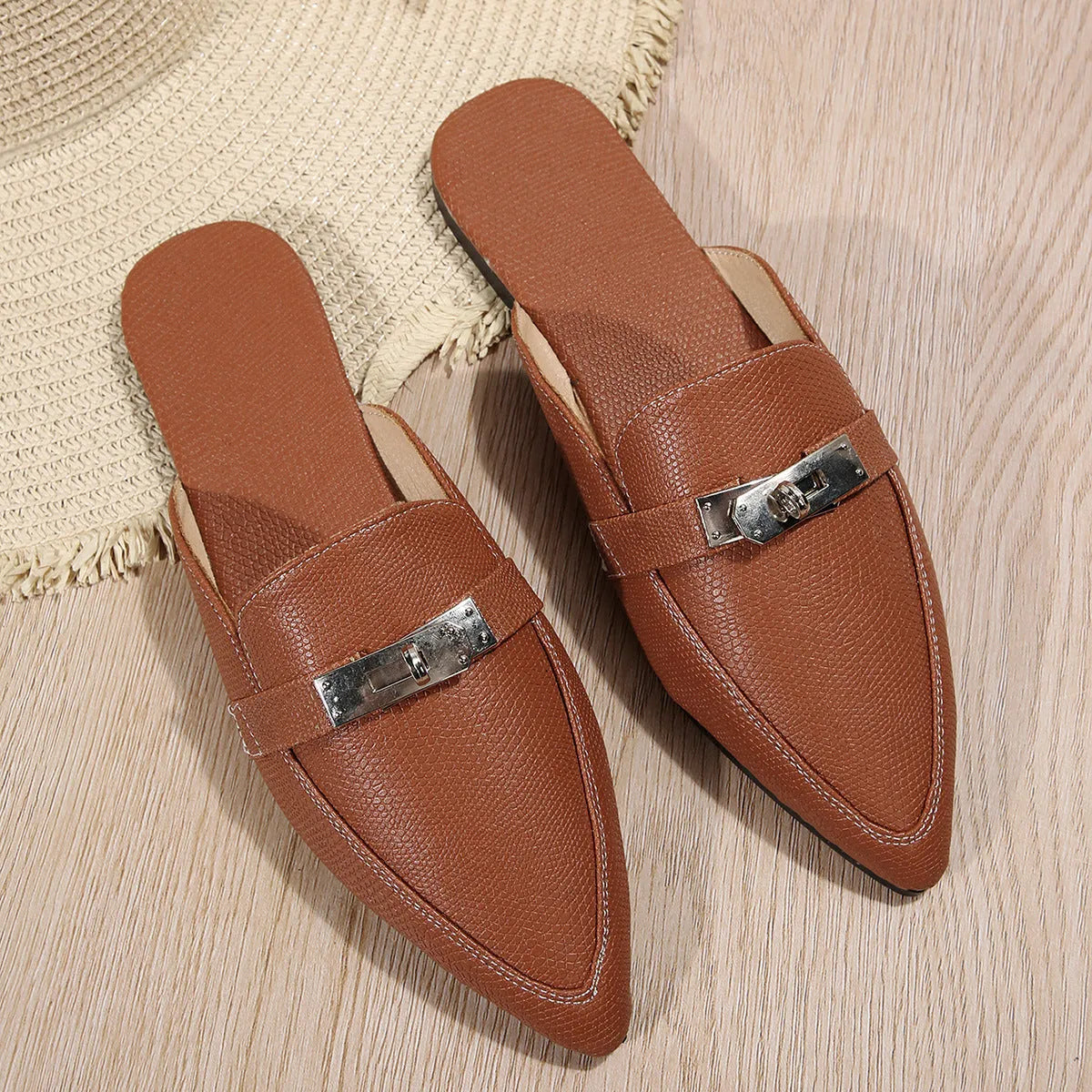 Light brown women's pointed-toe low-heel semi-slippers with a PU upper and rubber sole.
