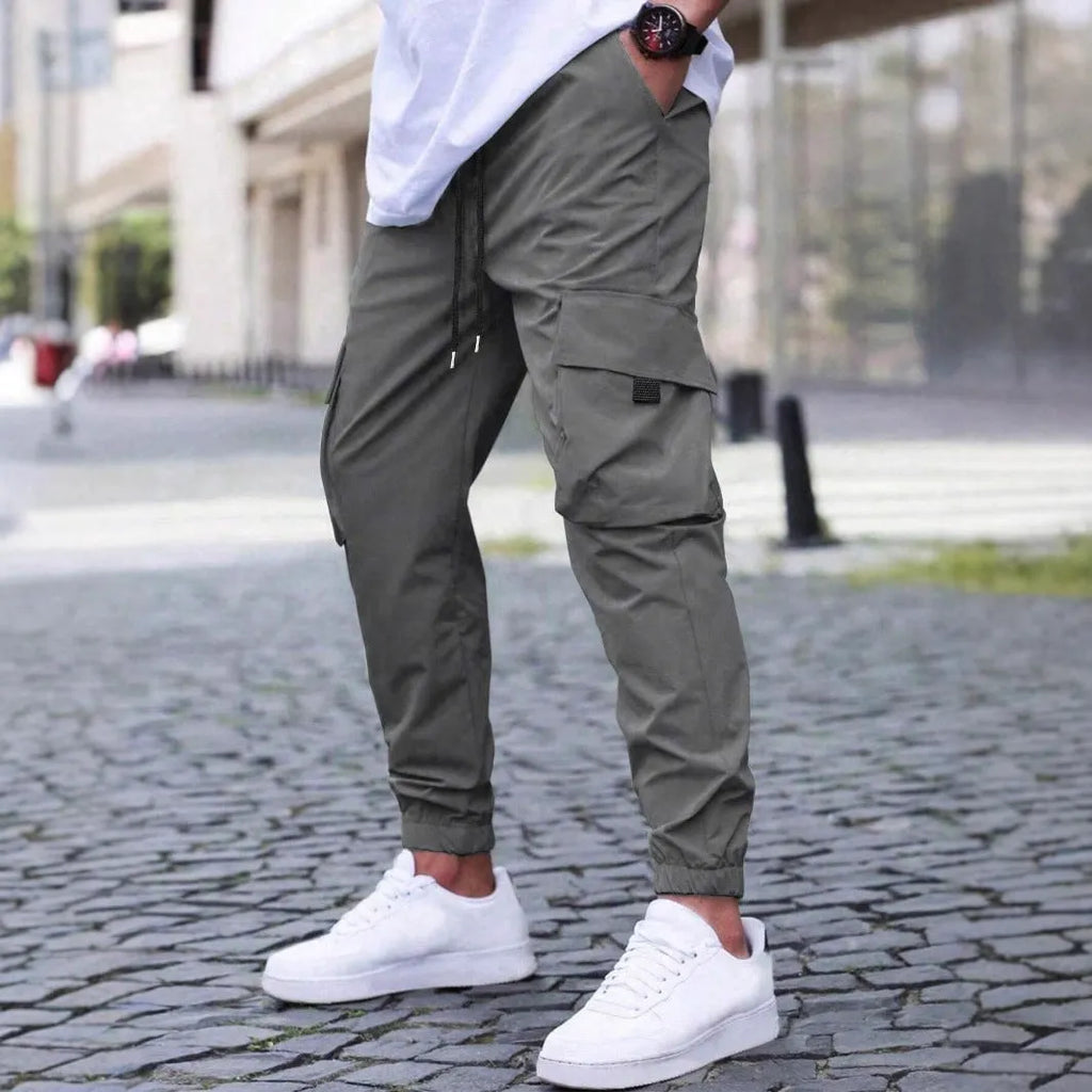 Solid colour polyester fibre workwear casual track pants with drawstring elastic waist, available in multiple colours