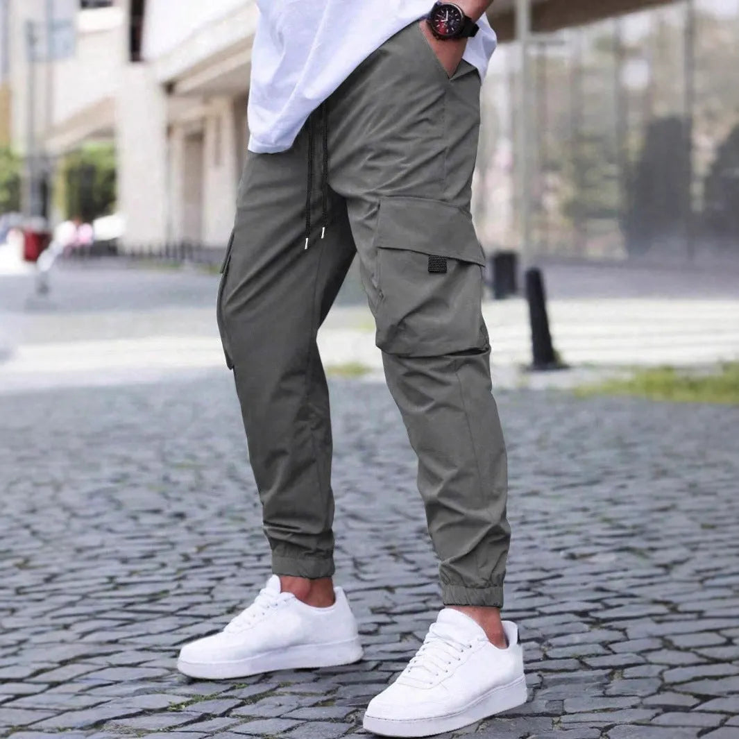 Solid colour polyester fibre workwear casual track pants with drawstring elastic waist, available in multiple colours