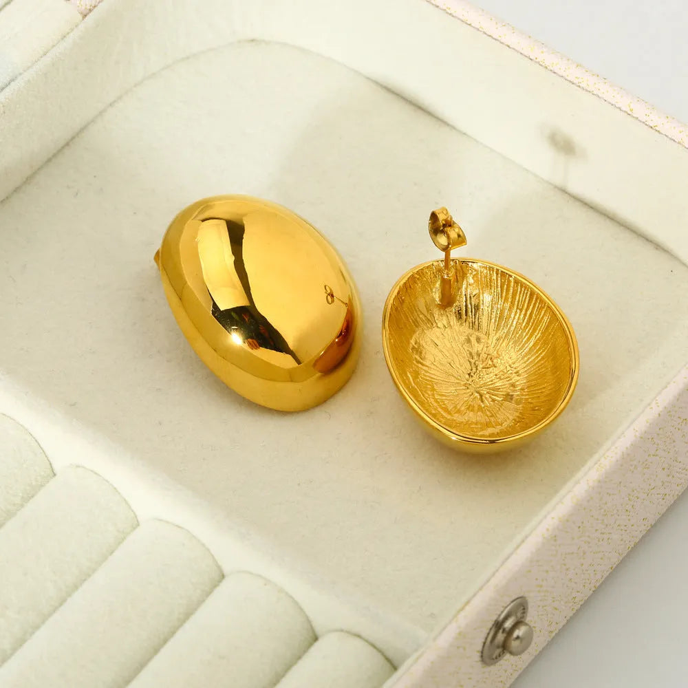 Geometric stainless steel ear studs with 18K gold electroplating and glazed surface in DFE139 colour