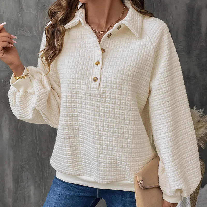 Women's beige textured polo collar long sleeve polyester sweater on a hanger.
